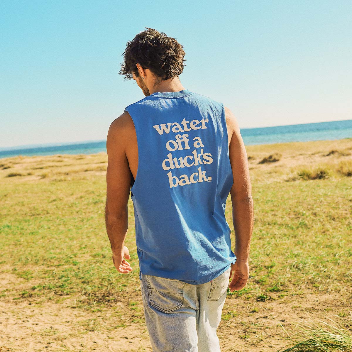 Ducks Back Slang Muscle Tank in Blue