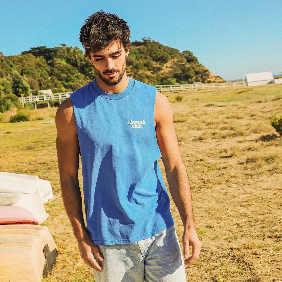 Ducks Back Slang Muscle Tank in Blue