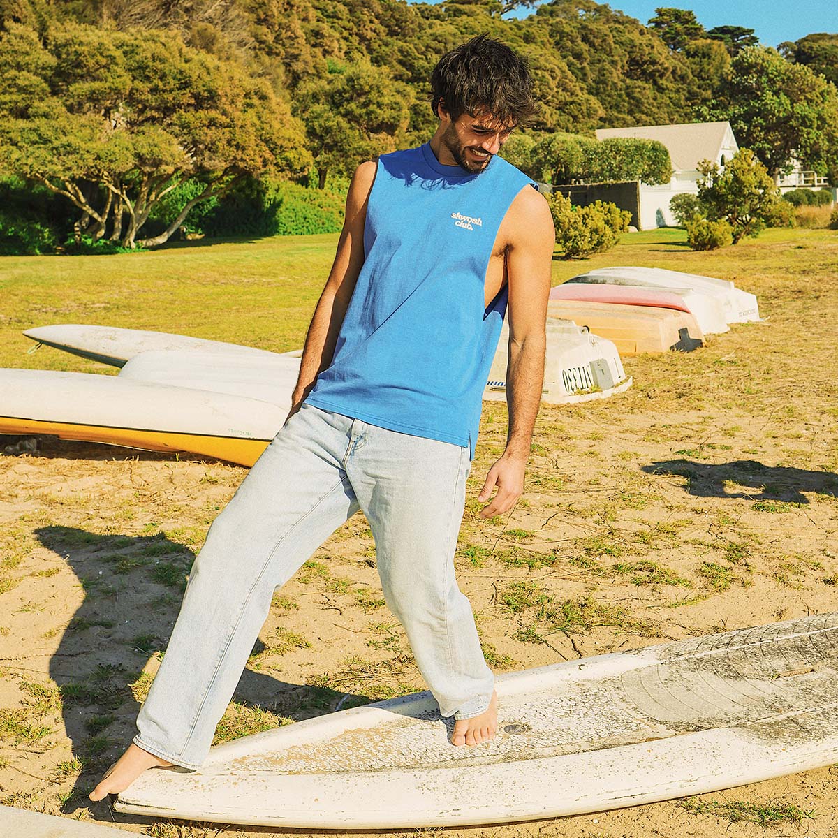 Ducks Back Slang Muscle Tank in Blue