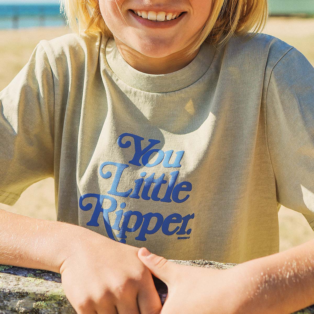 You Little Ripper Kids Slang Tee in Stone